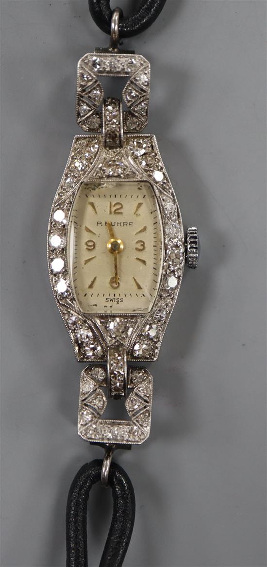 A ladys P. Buhre white metal (stamped All Plat) and diamond set cocktail watch, with fabric strap.